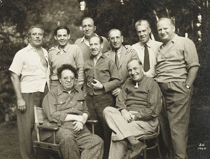 Diego-Rivera-far-left-first-row-Lucien-Labaudt-standing-far-left-and-Otis-Oldfield-center-with-pipe-pose-for-a-photo.-AAA_labaluci_11874